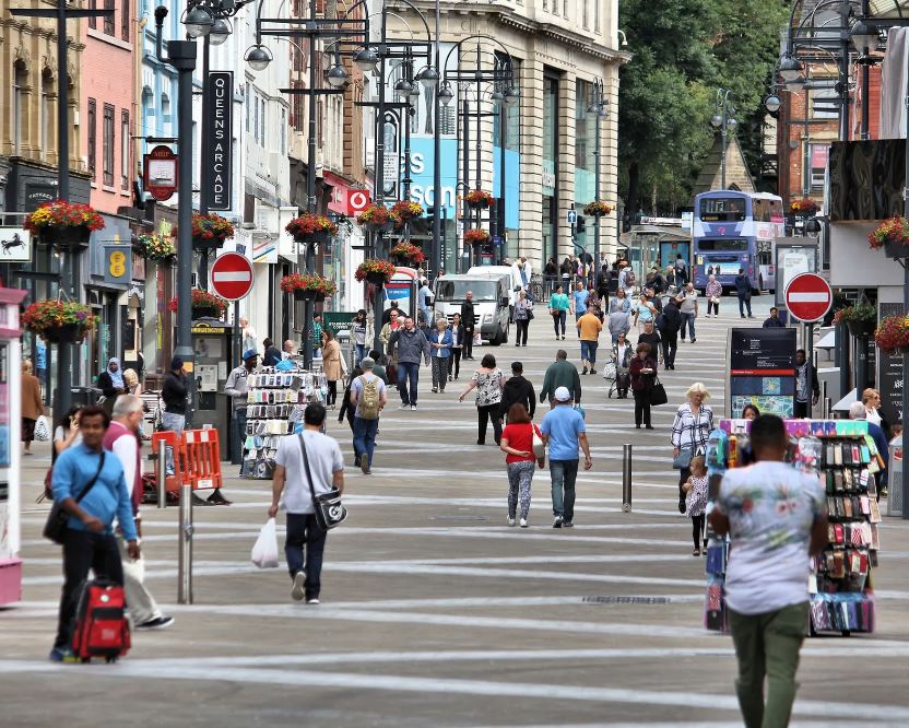 Looking up a busy, pedestrianised high street